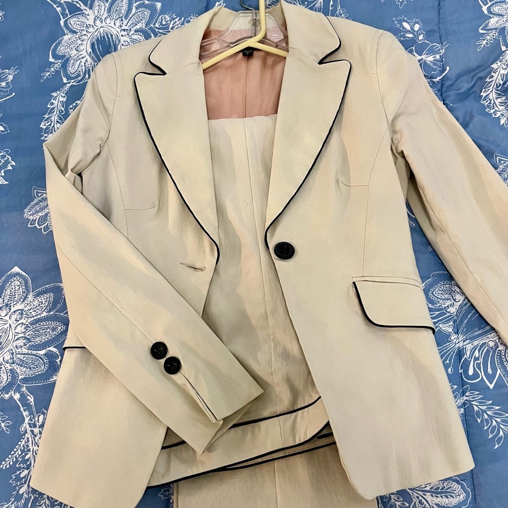 Bebe off white pantsuit. Worn once. Detailed in black